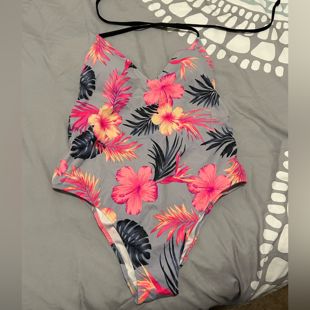Worn once Pink by Victoria secret once piece low back swim suit.